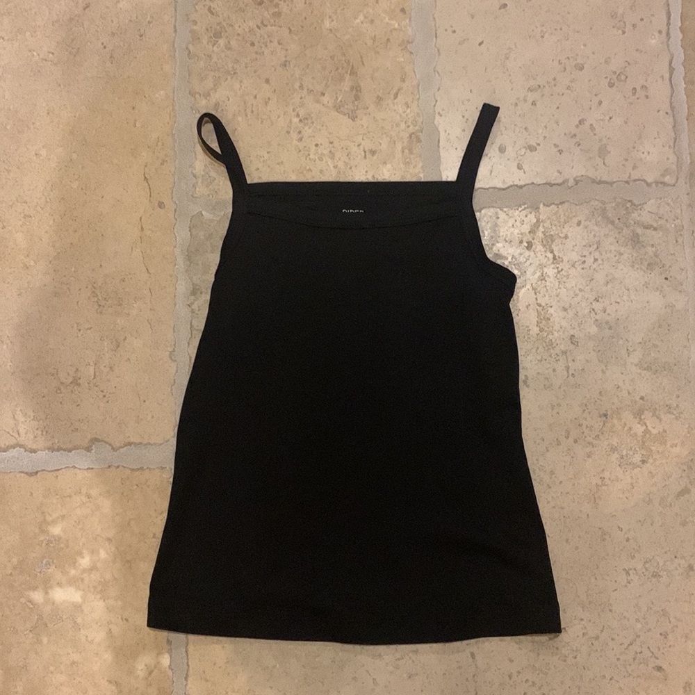 A cute black tank top in the brand piper